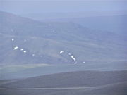 Hills turning green from brown in May near Fremont Butte.. Photo by Scott Almdale.