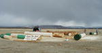 Workers ready the logs for the new gateway arch for the Old Brazzill Ranch subdivision road south of Pinedale.  Lots available will be 35+ acres in size.