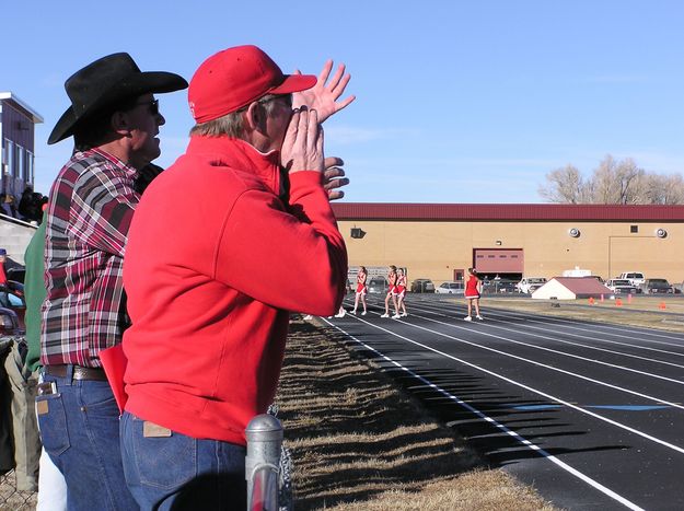 Dads cheer on. Photo by Pinedale Online.