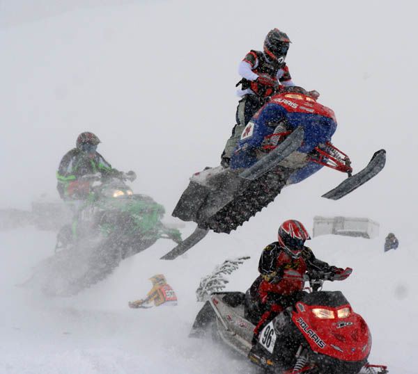 High flying snowmobiles. Photo by Clint Gilchrist, Pinedale Online.