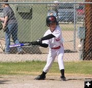 Swing batter swing. Photo by Clint Gilchrist, Pinedale Online.