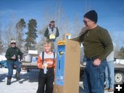 Jacob wins ice auger. Photo by Bill Boender.