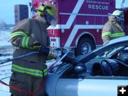 Working on the windshield. Photo by Sublette County Fire Board.