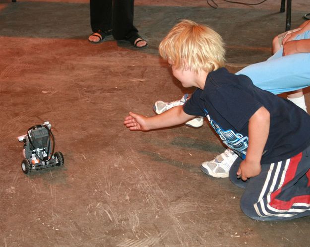 Turning Matthew's robot. Photo by Dawn Ballou, Pinedale Online.