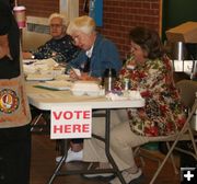 Handing out ballots. Photo by Dawn Ballou, Pinedale Online.