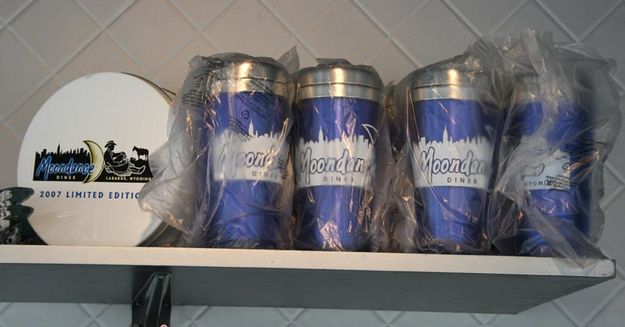 Cookie tins and travel mugs. Photo by Dawn Ballou, Pinedale Online.