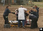 On the stretcher. Photo by Dawn Ballou, Pinedale Online.