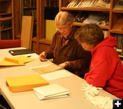 Checking documents. Photo by Dawn Ballou, Pinedale Online.