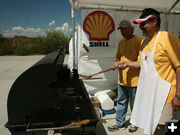 Flipping burgers. Photo by Dawn Ballou, Pinedale Online.