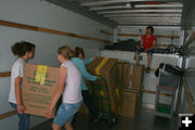 Loading the Truck. Photo by Pam McCulloch, Pinedale Online.