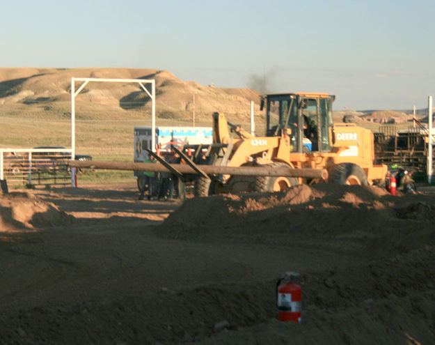 Removing barricade. Photo by Dawn Ballou, Pinedale Online.
