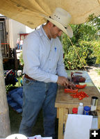 Cutting peppers. Photo by Dawn Ballou, Pinedale Online.