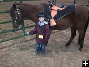 Ian getting ready. Photo by M.E.S.A. Therapeutic Horsemanship, Inc..