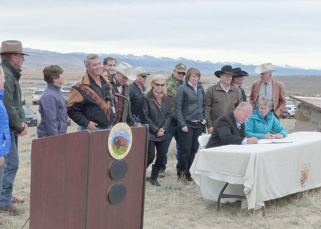 Signing ceremony. Photo by Dawn Ballou, Pinedale Online.