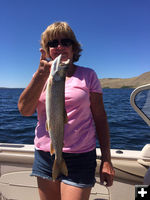 Sharon Holmes with her nice fish. Photo by Allan Holmes.