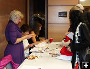 Registration table. Photo by Dawn Ballou, Pinedale Online.