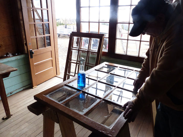 Window work. Photo by Dawn Ballou, Pinedale Online.