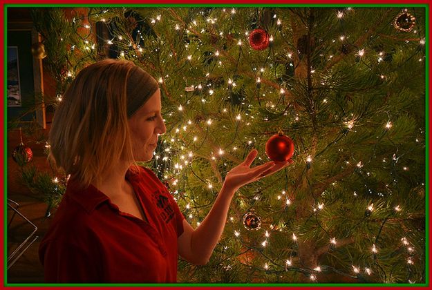 Chrissy at the Old Stones Smokehouse and Pizza Christmas Tree. Photo by Terry Allen.