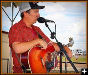 Jason Tyler Burton Entertained the Crowd with Music. Photo by Terry Allen.
