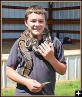 Mason Orm with Ball Python. Photo by Terry Allen.