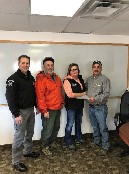 Enterprise donation to TTSAR. Photo by Sublette County Sheriff's Office.