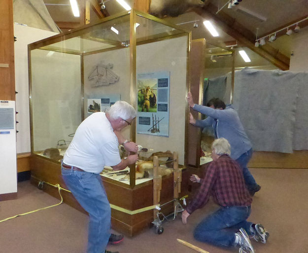 Moving display cases. Photo by Dawn Ballou, Pinedale Online.