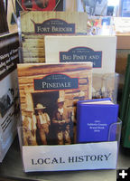 Local history books. Photo by Dawn Ballou, Pinedale Online.