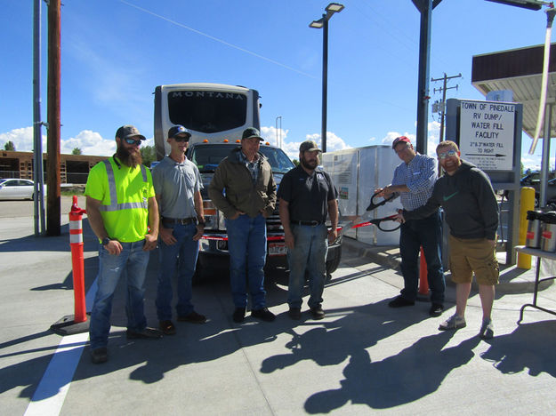 Ready to cut ribbon. Photo by Dawn Ballou, Pinedale Online.