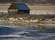 Barn Above Mostly Frozen Green River. Photo by Dave Bell.