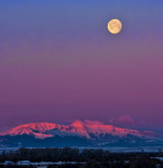 Pink Triple Peak And Setting Moon. Photo by Dave Bell.