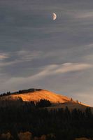 Moon Over Sunlit Ridgeline. Photo by Dave Bell.