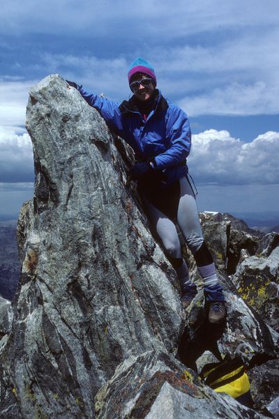 Sue on top of Mt. Arrowhead / Wind River Mtns. / circa 1987. Photo by Fred Pflughoft.