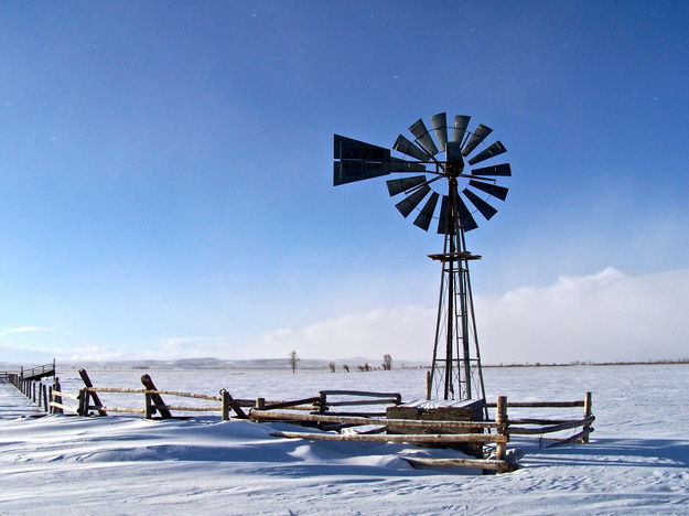 An abandoned windmill in one of historic, windswept ranches. Photo by Scott Almdale.