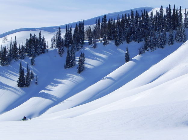 A snowmobiler in heaven at the Wyoming Range Mtns. snow dunes. Photo by Scott Almdale.